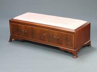 An ottoman formed from the base of an Edwardian wardrobe with upholstered drop in seat, the base fitted a drawer, raised on ogee bracket feet 42cm h x 135cm w x 52cm d