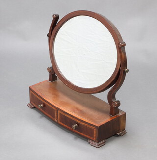A Georgian oval bevelled plate dressing table mirror contained in inlaid mahogany frame, the crossbanded base fitted 2 long drawers raised on bracket feet 55cm h x 52cm w x 21cm d 