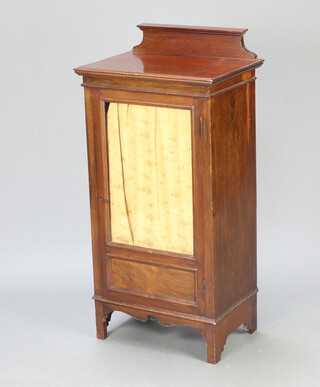 An Edwardian mahogany music cabinet with raised back, fitted shelves enclosed by a glazed panelled door 109cm h x 53cm w x 37cm d 
