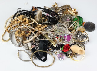 A silver bangle and vintage costume jewellery 