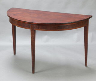 A 19th Century mahogany demi-lune table, raised on square tapered supports 72cm h x 122cm w x 61cm d 