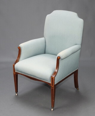 An Edwardian inlaid mahogany armchair upholstered in light blue material, raised on square tapered supports 101cm h x 63cm w x 59cm d (seat 26cm x 36cm) 