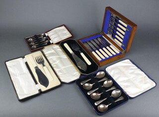 A cased set of silver plated fish eaters and 4 other cased sets 