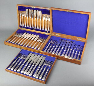 A mahogany canteen of silver plated fish eaters for 12, engraved ditto 