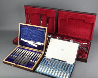 A cased set of 12 mother of pearl handled butter knives, 3 cased part canteens 