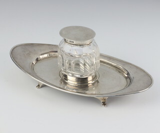 A Victorian oval silver ink stand with cut glass silver mounted inkwell, London 1913, 21cm, the base weighs 132 grams 