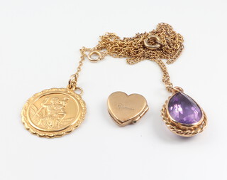 A 9ct gold yellow gold St Christopher pendant together with a yellow metal mounted amethyst pendant on a gilt chain 4.6 grams weighable 