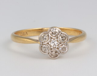 A yellow metal 18ct diamond cluster ring, 1.8 grams, size K 1/2