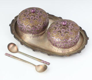 A pair of Korean white metal enamelled pots and covers and 2 spoons on a matching tray 
