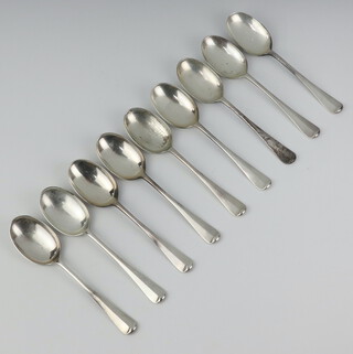 Nine silver rat tail dessert spoons, 492 grams, Sheffield 1926 