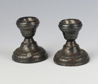 A pair of silver dwarf candlesticks of vase form 6cm, Birmingham 1928 