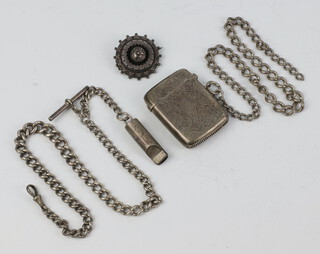 An Edwardian silver vesta Birmingham 1905, 2 silver watch chains, a silver brooch and a white metal whistle, gross weight 102 grams 