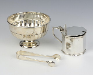 A silver sugar bowl Sheffield 1926, a pair of sugar nips and a mustard, 178 grams