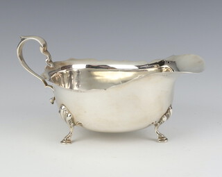 A silver sauce boat with pad feet and S scroll handle Birmingham 1934, 116 grams 