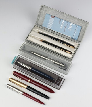 A red cased Parker Maxima fountain pen with 14ct nib, 1 other, 3 ballpoint pens, a ballpoint pen and a propelling pencil 