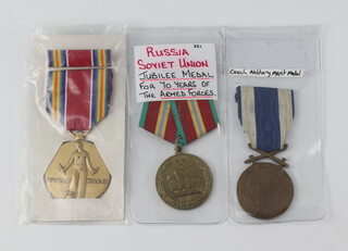 A United States World War Two campaign and Service Victory medal, a Czechoslovakian military Merit medal and a Russian Soviet Union Jubilee medal for 70 Years of the Armed Forces 

