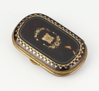 A Victorian gilt metal mounted tortoiseshell purse 