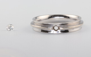 A white metal wedding band size L, 4.3 grams, together with a loose diamond 0.10ct 