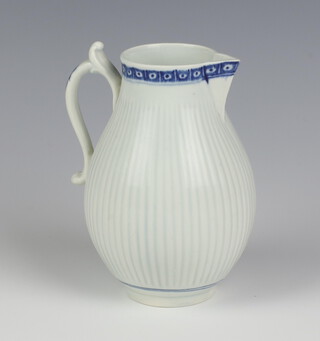 An 18th Century Worcester blue and white bulbous jug with scroll handle 12cm 