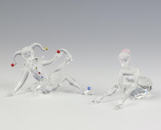 A Swarovski Crystal figure of a seated harlequin, ditto of a ballet dancer, 5cm, boxed 