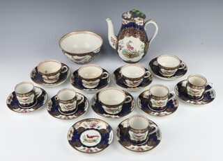 A 19th Century Worcester style coffee set comprising coffee pot, 5 coffee cans, 6 saucers, 5 tea cups, 5 saucers and a sugar bowl, the blue ground with gilt decoration and panels of birds, insects and flowers  