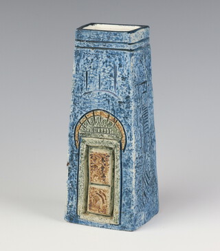 A Troika coffin vase, circa 1975, with stylised motifs decorated by Sue Lowe, in cream and green on a blue ground, 16.5cm