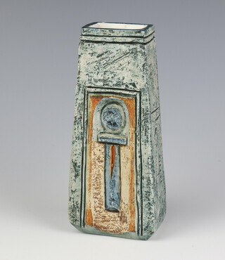 A Troika coffin vase, circa 1974, by Teo Bernatowitz, with blue and tan decoration on a green ground, chip to rim, 16.5cm
