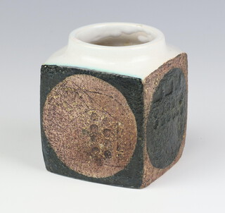 A Troika marmalade pot, circa 1970 by Marilyn Pascoe, with oatmeal and charcoal/ dark green abstract circles with a white glazed interior 9cm 