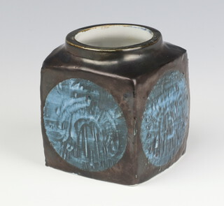 A Troika style marmalade pot, black glazed with circular panels of blue decoration, printed mark 9cm  
