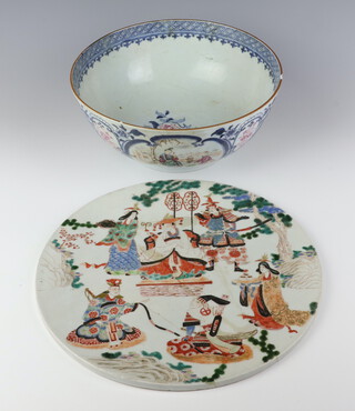 An 18th Century Chinese famille rose bowl decorated with panels of figures at pursuits 26cm together with a Japanese porcelain circular plaque decorated with figures 30cm 
