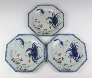 Three 18th Century Chinese famille rose octagonal plates decorated with a crab and crayfish amongst peony 22cm 