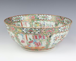 A 19th Century Cantonese punch bowl the interior decorated with panels of figures and pursuits and panels of birds amongst flowers, the exterior similarly decorated  37cm 