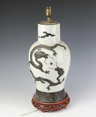 A Chinese crackle glazed vase decorated with dragons converted to electricity (drilled), 40cm 