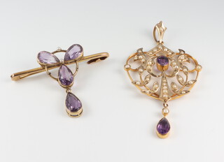 A 9ct yellow gold amethyst and seed pearl pendant, a yellow metal ditto bar brooch, 6 grams