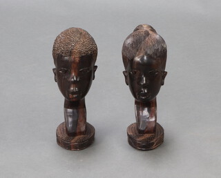 An African carved portrait bust of a lady 40cm x 13cm x 14cm and 2 others 