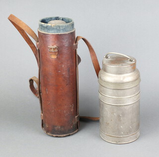 A cylindrical Thermos with metal outer casing 26cm x 13cm diam., base marked Thermos (1923 Ltd London), together with a Stanley Ferrostat flask contained in a leather case  