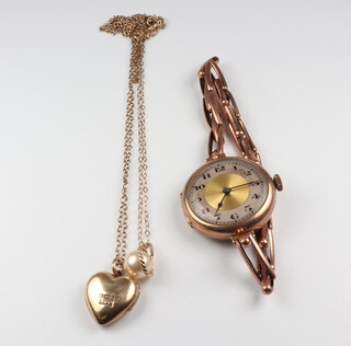 A lady's 9ct yellow gold wristwatch and bracelet 18cm, together with 2 pendants and a chain 40cm gross weight 20 grams 