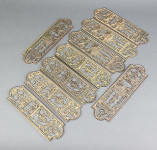 Two pairs of pierced gilt metal finger plates with urn and swag decoration 24cm x 7cm together with 5 others 26cm x 7cm 
