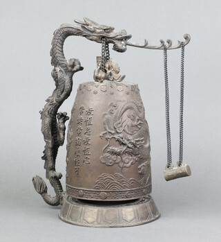 A bronze model of a Tibetan temple bell 33cm x 17cm 