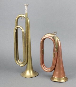 The Rex Ratt Official brass bugle Boy Scouts of America together with a copper and brass bugle 