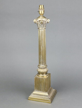 A gilt metal Corinthian column table lamp, raised on a square foot 48cm h x 15cm w x 15cm d 