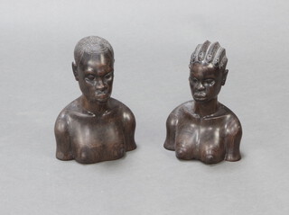 Two Nigerian carved hardwood portraits busts of a lady and gentleman 24cm x 16cm x 8cm together with 1 other portrait bust of a lady 49cm x 21cm x 11cm 