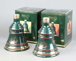 Two 70cl Bells Wade whisky ceramic decanters - 1993 Christmas Whisky, boxed  