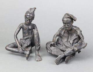 Two Benin bronze figures of seated tribesman 13cm x 12cm x 10cm 