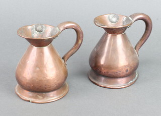 Two Victorian copper half pint harvest measures 12cm x 9cm (some dents)