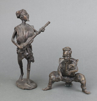 A Benin bronze figure of a standing musician on an oval base 21cm together with a seated musician 11cm 