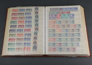 A stock book of Commonwealth mint and mounted stamps George VI to Queen Elizabeth - Ascension, Australia, British Virgin Islands, New Zealand, Barbados, etc 