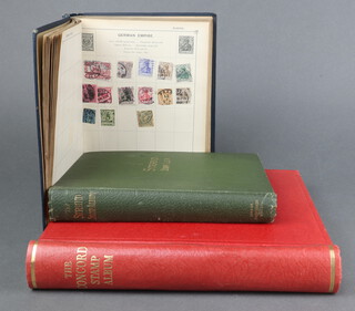 A blue Standard stamp album of used world stamps including GB, France, German Empire, a green ditto - British India, Ceylon, Russia, Italy, Holland, German Empire, a red Concord album of mint and used Australian stamps George V to QEII 