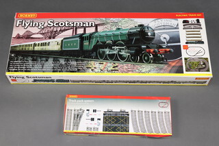 A Hornby OO gauge R1039 Flying Scotsman electric train set, boxed, a Hornby R8017 Track Pack System, boxed 