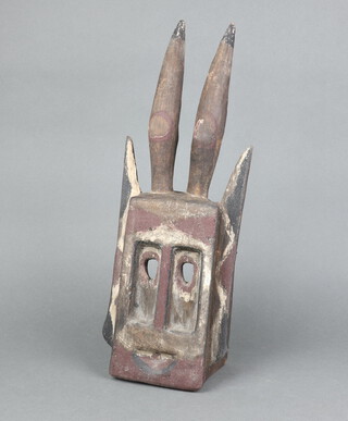 A carved wooden Walu (antelope) funeral mask by the Dogon people of Mali 52cm x 20cm x 10cm 